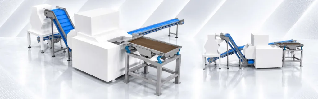 : Integrated conveyors and processing equipment in a food production line, showing how product handling systems connect different production stages.
